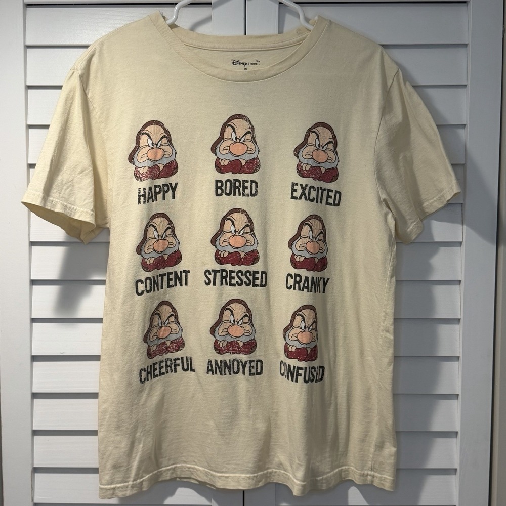Disney Store T-Shirt M Tan Grumpy Seven Dwarfs Many Moods Graphic Distressed